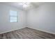 Bedroom features neutral colors, one window, and vinyl flooring at 7261 E Teal Way, San Tan Valley, AZ 85143