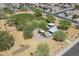 Aerial view of community park, playground, covered picnic benches, and lush landscaping at 7261 E Teal Way, San Tan Valley, AZ 85143