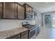 This kitchen showcases subway backsplash and stainless steel gas range at 7261 E Teal Way, San Tan Valley, AZ 85143