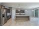 Well-designed kitchen featuring stainless steel appliances and an oversized kitchen island at 7261 E Teal Way, San Tan Valley, AZ 85143