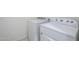 Functional laundry room with modern washer and dryer units at 7261 E Teal Way, San Tan Valley, AZ 85143