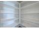 Open pantry space for storage with white shelves at 7261 E Teal Way, San Tan Valley, AZ 85143