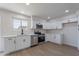 Bright kitchen features white cabinets, stainless steel appliances, and marble countertops at 733 W El Prado Rd, Chandler, AZ 85225