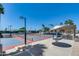 View of the community pickleball courts with shade structures and desert landscaping at 8449 W Rockwood Dr, Peoria, AZ 85382