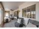 Spacious sun room with tile flooring and sliding glass windows at 8449 W Rockwood Dr, Peoria, AZ 85382
