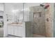 Modern bathroom featuring a walk-in shower with decorative tile and a sleek vanity at 853 W Hemlock Way, Chandler, AZ 85248