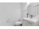 Clean and simple powder room with a modern vanity, toilet, and neutral finishes at 853 W Hemlock Way, Chandler, AZ 85248