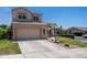 Charming two-story home with landscaped front yard, desert landscaping, and a concrete driveway at 853 W Hemlock Way, Chandler, AZ 85248