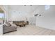 Large living room featuring a sectional sofa, vaulted ceilings, and ample natural light at 853 W Hemlock Way, Chandler, AZ 85248