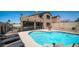Beautiful pool and patio area with a safety fence and cozy seating at 853 W Hemlock Way, Chandler, AZ 85248