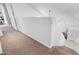 Carpeted staircase leading to the upper level of the home, with a neutral color scheme at 853 W Hemlock Way, Chandler, AZ 85248