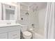Well-lit bathroom features a large shower and vanity with stylish fixtures and finishes at 8538 E Portland St, Scottsdale, AZ 85257