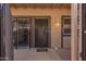 Inviting front entryway features a security gate and a covered porch at 8538 E Portland St, Scottsdale, AZ 85257