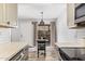 Bright kitchen with white subway tile backsplash, stainless steel appliances and breakfast nook at 8538 E Portland St, Scottsdale, AZ 85257