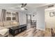 Open-concept living room and dining area with wood floors and bright natural light at 8538 E Portland St, Scottsdale, AZ 85257