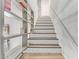 Staircase features wood treads and attractive geometric patterned risers at 8538 E Portland St, Scottsdale, AZ 85257