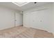 Bedroom with neutral walls, carpet, and double door closet at 8552 E Indian School Rd # B, Scottsdale, AZ 85251