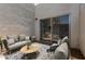 Cozy patio with modern furniture and a sliding glass door at 8552 E Indian School Rd # B, Scottsdale, AZ 85251