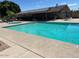 Inviting community swimming pool, a cool retreat, with ample deck space for sunbathing and relaxation at 8600 E Broadway Rd # 53, Mesa, AZ 85208