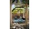 Outdoor back patio featuring a bamboo fence and two chairs at 917 W Willetta St, Phoenix, AZ 85007