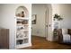 Arched doorway revealing built-in shelving in the sitting room at 917 W Willetta St, Phoenix, AZ 85007