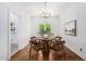 Cozy dining area with a round wooden table, stylish chairs, and modern lighting at 917 W Willetta St, Phoenix, AZ 85007