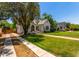 Charming single-story home with a well-manicured lawn and mature trees in a quiet neighborhood at 917 W Willetta St, Phoenix, AZ 85007