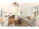 Spacious living room filled with natural light, showcasing hardwood floors and comfortable seating at 917 W Willetta St, Phoenix, AZ 85007