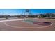 Basketball court surrounded by greenery and community homes at 9831 E Tupelo Ave, Mesa, AZ 85212