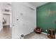 Bedroom features a closet with sliding doors and an accent wall with a personalized nameplate at 9831 E Tupelo Ave, Mesa, AZ 85212