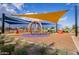 Shaded playground area with climbing structures and colorful balls at 9831 E Tupelo Ave, Mesa, AZ 85212