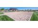 Sand volleyball court with grassy area, perfect for outdoor recreation at 9831 E Tupelo Ave, Mesa, AZ 85212