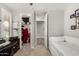 Bright bedroom featuring a cozy daybed and an organized closet space at 10310 E Tillman Ave, Mesa, AZ 85212