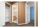 Hallway with bedrooms, bathrooms and closets, offering storage and easy access throughout the home at 1106 E Altadonna St, San Tan Valley, AZ 85140