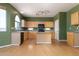 Well-appointed kitchen with wood cabinets and large center island at 1106 E Altadonna St, San Tan Valley, AZ 85140