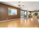 Spacious living room and dining area lead to an open-concept kitchen at 1106 E Altadonna St, San Tan Valley, AZ 85140