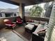Inviting covered patio with comfortable seating, an outdoor rug, and serene views at 11680 E Sahuaro Dr # 2011, Scottsdale, AZ 85259