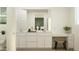 Bright bathroom with double vanity, modern fixtures, and a separate makeup counter at 11940 W Calle De Pompas --, Peoria, AZ 85383