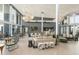 Community lounge featuring stylish seating arrangements and floor to ceiling windows at 11940 W Calle De Pompas --, Peoria, AZ 85383