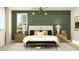 Stylish main bedroom with a decorative accent wall, bedside tables, and unique lighting at 11940 W Calle De Pompas --, Peoria, AZ 85383