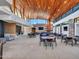 Community Center featuring a modern space with tables, chairs, and a fireplace at 12706 W Pasaro Dr, Peoria, AZ 85383