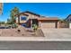 Charming two-story home featuring a brick facade, desert landscaping and a two-car garage at 13051 N 75Th Dr, Peoria, AZ 85381