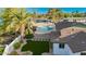 Beautiful backyard featuring a pool, patio, and lush landscaping at 13601 N 50Th Pl, Scottsdale, AZ 85254