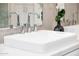 The stylish bathroom features a square vessel sink, designer faucet and ample vanity counterspace at 13601 N 50Th Pl, Scottsdale, AZ 85254