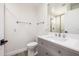 Bathroom featuring a modern vanity with white marble countertop and framed mirror at 13601 N 50Th Pl, Scottsdale, AZ 85254