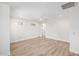 Spacious bedroom featuring wood-look flooring and overhead ceiling fan at 13601 N 50Th Pl, Scottsdale, AZ 85254