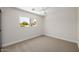 This bedroom provides comfortable carpet, fresh paint, and a large window for lots of light at 13601 N 50Th Pl, Scottsdale, AZ 85254