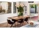 Bright dining room with modern lighting fixture and view of backyard patio at 13601 N 50Th Pl, Scottsdale, AZ 85254