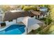 Inviting backyard pool area with shaded lounge space and mature landscaping at 13601 N 50Th Pl, Scottsdale, AZ 85254