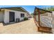 Side yard features a gravel ground cover and wooden pergola at 13601 N 50Th Pl, Scottsdale, AZ 85254